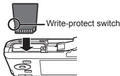 OLYMPUS VG-180 - Insert the card straight until it clicks into place. - 1