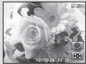 OLYMPUS VH-410 - Press the zoom lever. - 2