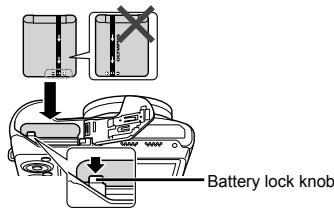 OLYMPUS SZ-16 - Insert the battery while sliding the battery lock knob in the direction of the arrow. - 1