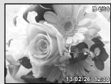 OLYMPUS SZ-16 - Turn the zoom lever. - 2