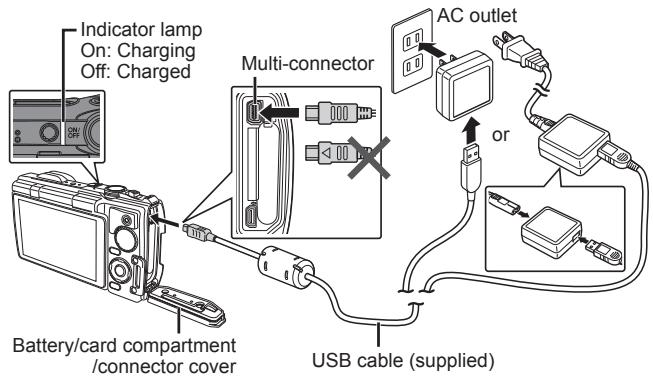 OLYMPUS TG 850 - Connect the USB cable and USB-AC adapter to the camera and charge the battery. - 1