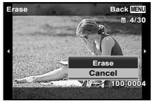 OLYMPUS TG3 - Display the image you want to erase and press  (面). - 2