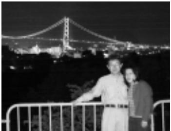 OLYMPUS CAMEDIA E-10 - Shooting a Subject Against a Night Scene Background (Slow Synchronization) - 2
