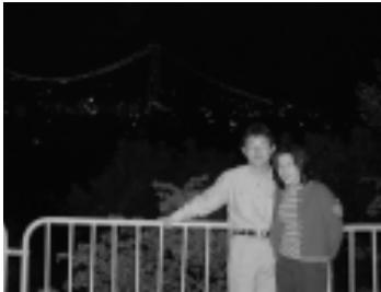 OLYMPUS CAMEDIA E-10 - Shooting a Subject Against a Night Scene Background (Slow Synchronization) - 1