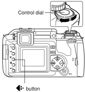 OLYMPUS E-300 - After pressing the button, rotate the control dial. - 1