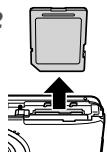 OLYMPUS D-710 - To remove the SD/SDHC memory card - 2