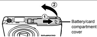 OLYMPUS D-710 - Inserting the battery and the SD/SDHC memory card (sold separately) - 1