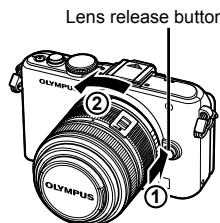 OLYMPUS E-PL3 - Removing the lens from the camera - 1