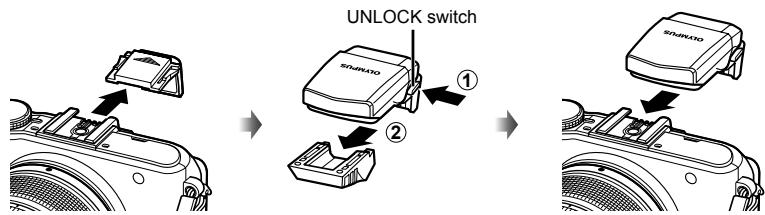 OLYMPUS E-PL3 - Removing the lens from the camera - 2
