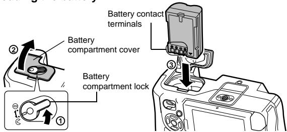 OLYMPUS E-5 - Loading the battery - 1