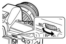 OLYMPUS E-5 - While holding down the MODE button, turn the main dial to set the shooting mode to M. Turn the dials to set the aperture value and the shutter speed. - 2