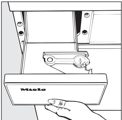 MIELE T 494 C - Emptying the condensed water container - 1