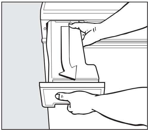 MIELE T 1332 C - Emptying the condensed water container - 1
