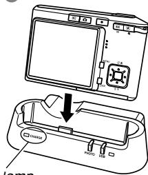 Diagram showing a device with labeled ports and an arrow pointing to a component, possibly indicating a location or assembly.