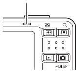 CASIO EXILIM EX-Z22 - Half-press the shutter button to focus the image. - 2