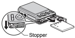 CASIO EXILIM EX-Z22 - Open the battery cover and remove the current battery. - 1