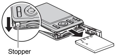 CASIO EXILIM EX-Z29 - Open the battery cover and remove the current battery. - 1