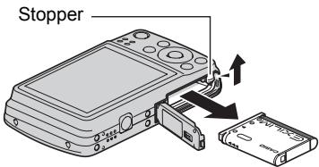 CASIO EXILIM EX-Z550 - Open the battery cover and remove the current battery. - 1