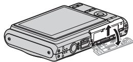 CASIO EXILIM EX-Z65 - Open the battery cover. - 1