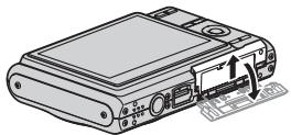 CASIO EXILIM EX-Z65 - Open the battery cover. - 1