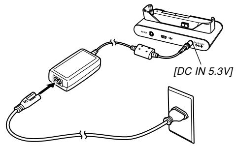 CASIO EXZ6-EX-Z7 - Connect the bundled AC adaptor to the [DC IN 5.3V] connector of the USB cradle, and then plug it in to a household power outlet. - 1