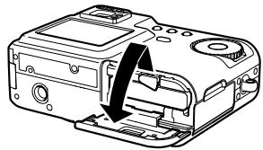 CASIO QV-R3 - To load the battery into the camera - 1