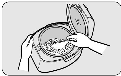 SANYO ECJ-D100S - Stir the rice and make it level. - 1