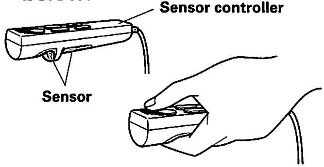 SANYO HEC-DR3000 - Grasp the Sensor as shown below. - 1