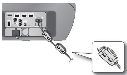 SAMSUNG HT-D7200B - Colocacion del nucleo de ferrita toroidal en los cables de los altavoces del subwoofer - 1