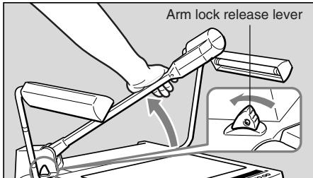 CANON RE-455X - Press the arm lock release lever, and raise the arm until it stops. - 2