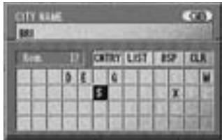 ALPINE NVE-N077P-PS-SPACE-SOFTWARE - The character pallet is displayed. Tilt the joystick to select the desired character for the first position of the city name and press ENTER. The entered character appears at the first position of the text window. - 1