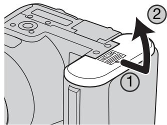 MINOLTA DIMAGE Z6 - Mise en place des piles/accus - 1