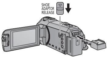 PANASONIC HC-VX870 - Retrait de l'adaptateur de griffe porte-accessoires - 1