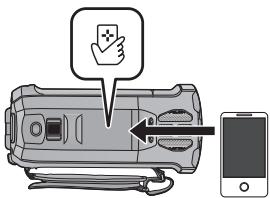 PANASONIC HC-VX870 - Placez le téléphone intelligent en contact avec sur cet appareil. - 1
