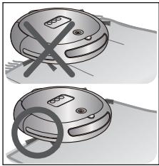 SAMSUNG SR8751 NAVIBOT LIGHT - Pour les tapis munis de longues franges, repliez ces dernières sous le tapis. - 1