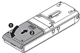 OM SYSTEM WS 882 - Insertion de la pile - 2