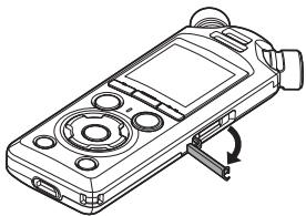 OM SYSTEM LSP5 - Retrait d'une carte microSD - 1