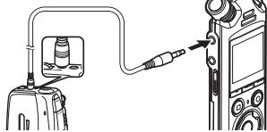 OM SYSTEM LSP5 - Branchez le lecteur de musique sur la prise microphone/ligne de l'enregistreur (♀). - 1