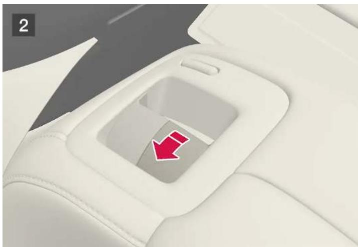 VOLVO XC60 (2024) - Rabattre l'appui-tête extérieur de banquette arrière avec la poignée - 2