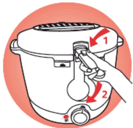 Illustration of a kitchen appliance with labeled parts and directional arrows indicating process flow