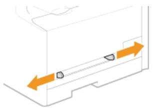 CANON I-SENSYS MF8580CDW - Écartez les guides papier. - 1