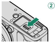 FUJIFILM X-E3 - Close the battery-chamber cover. - 3