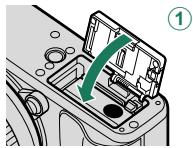 FUJIFILM X-E3 - Close the battery-chamber cover. - 2