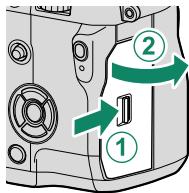 FUJIFILM X-H1 - Open the memory card slot cover. - 1