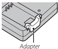 FUJIFILM X-T100 - Place the battery in the charger. - 2