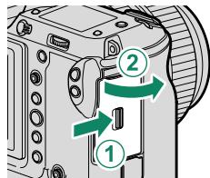 FUJIFILM GFX 100 - Open the memory card slot cover. - 1