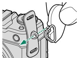 FUJIFILM GFX 100 - Place the strap clip on an eyelet. - 2