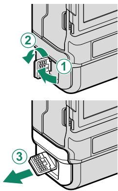 FUJIFILM GFX 100 - Remove the battery tray. - 2