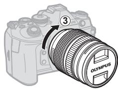 OLYMPUS E-M1 MARK II - Montage d'un objectif sur l'appareil photo - 3