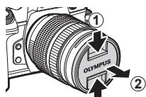 OLYMPUS E-M1 MARK II - ■ Retrait du bouchon de l'objectif - 1